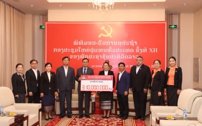 ມອບ-ຮັບ ເງິນຊຸກຍູ້ກອງປະຊຸມໃຫຍ່ ຄັ້ງທີ XII ຂອງພັກ